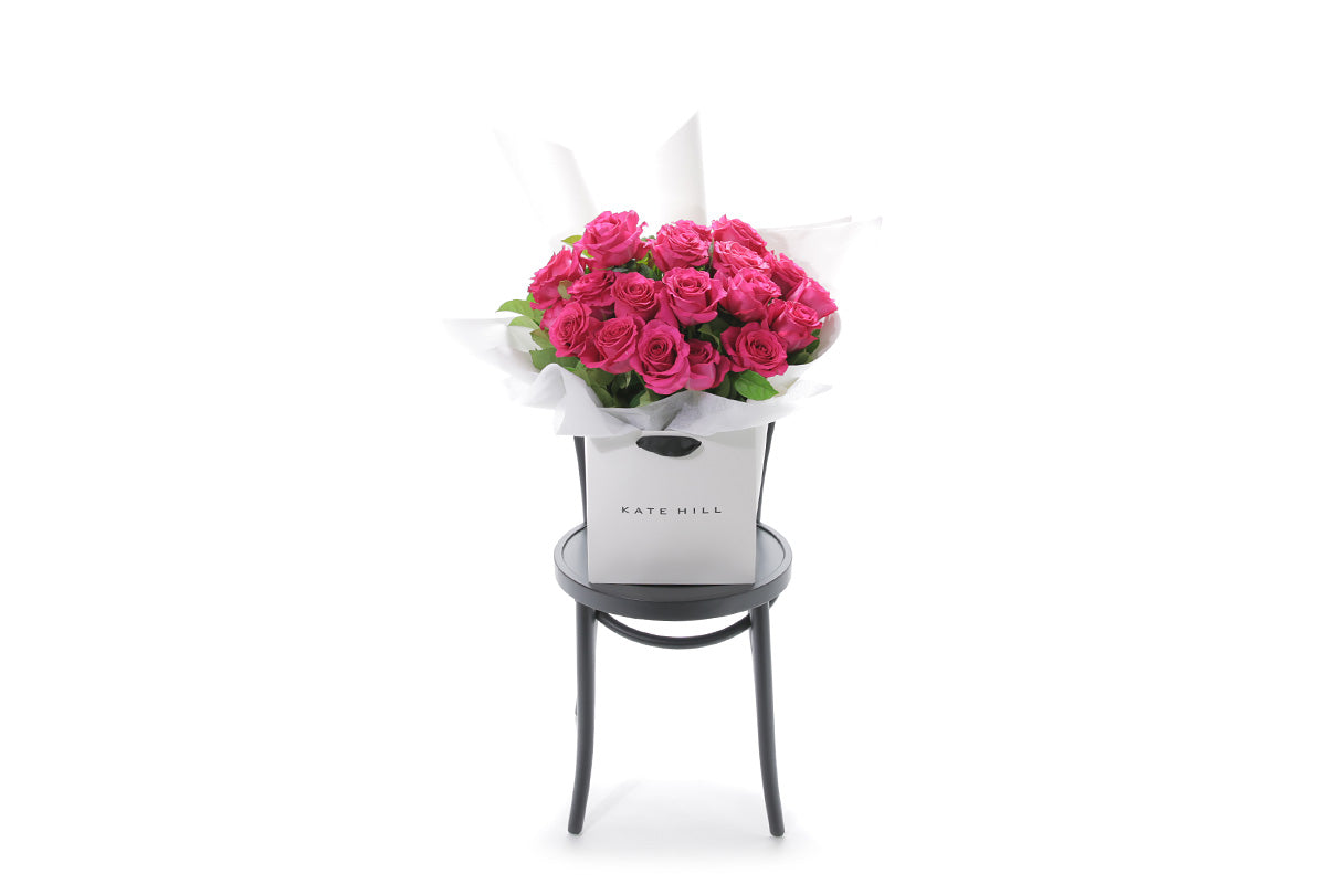 FLOYD large hot pink rose bouquet in Kate Hill Flowers signature wrapping