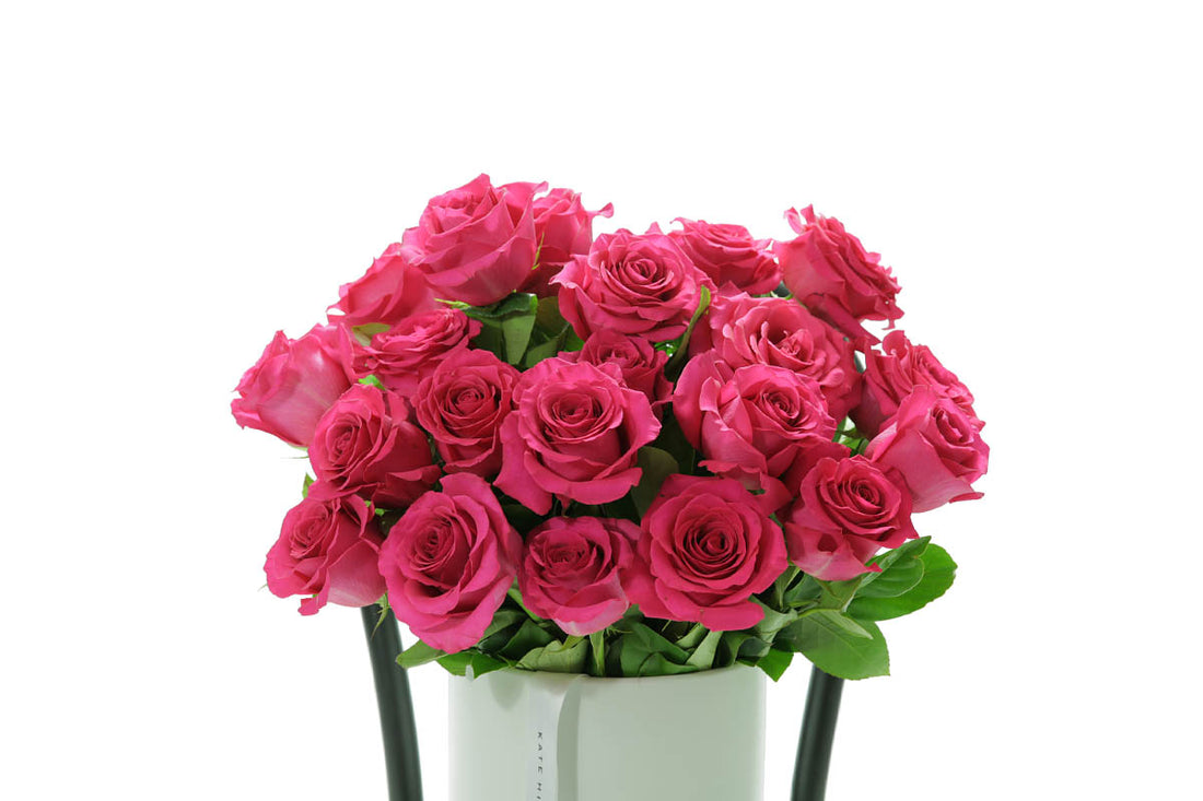 Close-up of FLOYD ceramic design with hot pink roses