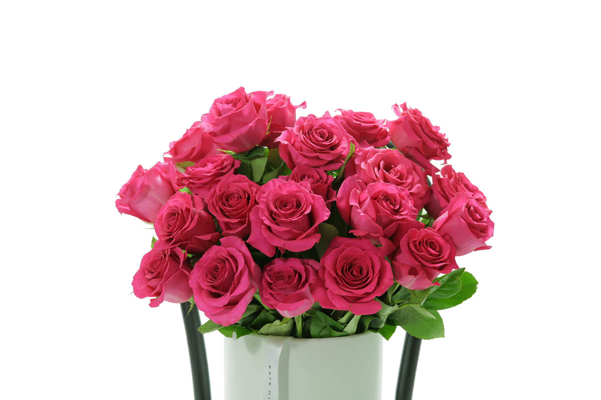 Close-up of FLOYD ceramic design with hot pink roses
