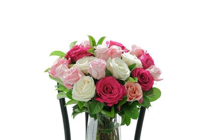 Close-up of HALEY large tapered vase with mixed-colour roses