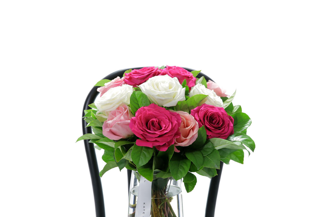 Close-up of HALEY tapered vase with mixed-colour roses