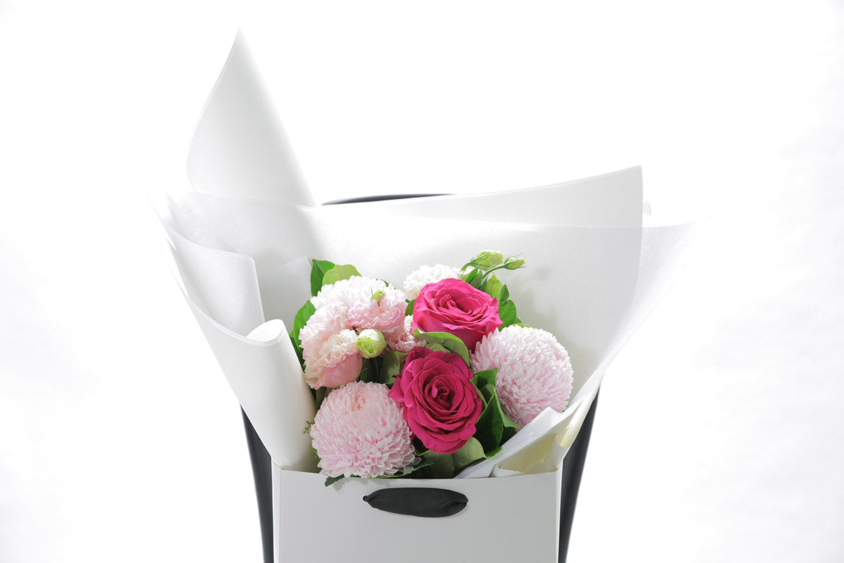 Close-up of HARPER bouquet with soft pink and blush seasonal blooms