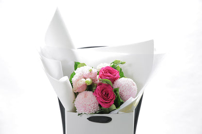 Close-up of HARPER bouquet with soft pink and blush seasonal blooms