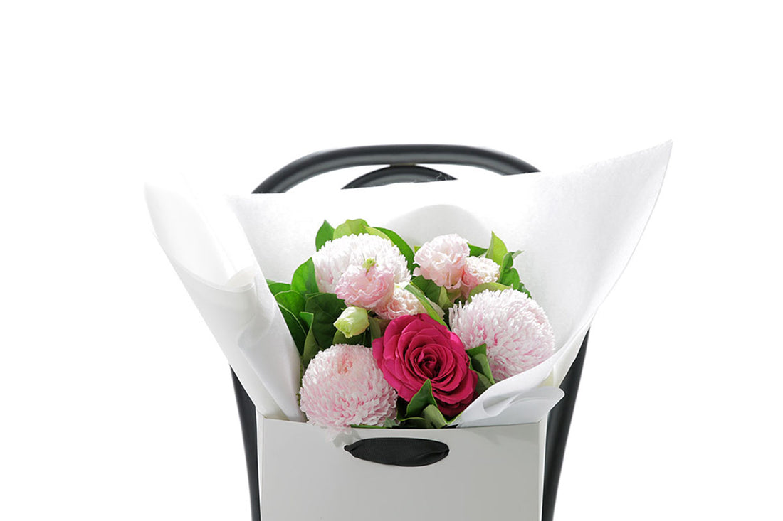 Close-up of HARPER small bouquet with soft pink and blush seasonal blooms