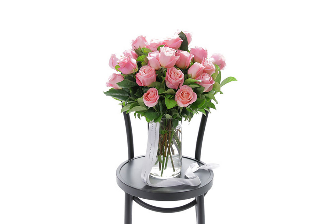 HERMOSA large watermelon roses in a tapered glass vase by Kate Hill Flowers Melbourne