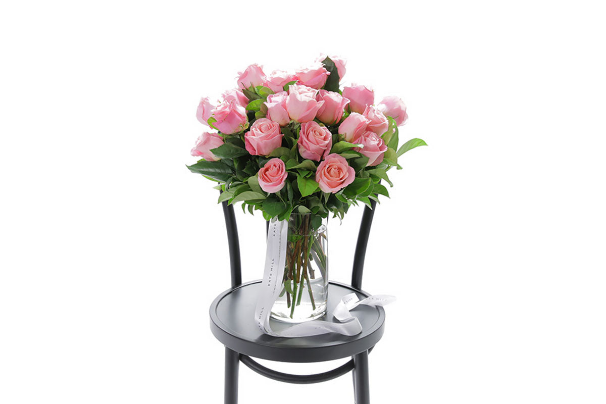 HERMOSA large watermelon roses in a tapered glass vase by Kate Hill Flowers Melbourne