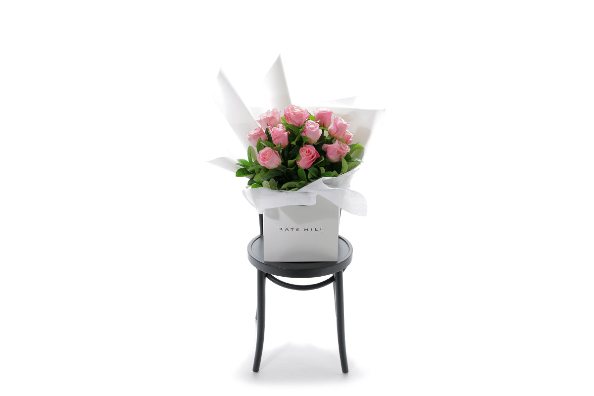 HERMOSA watermelon rose bouquet in Kate Hill Flowers signature wrapping