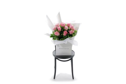 HERMOSA watermelon rose bouquet in Kate Hill Flowers signature wrapping