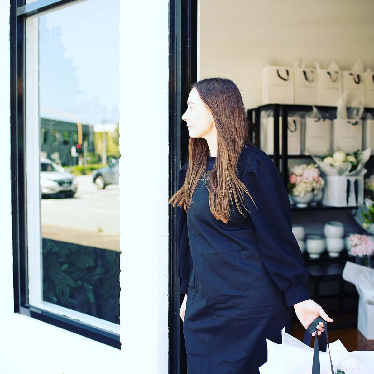Kate Hill at the door of the Kate Hill Flowers studio, 440 City Road Southbank