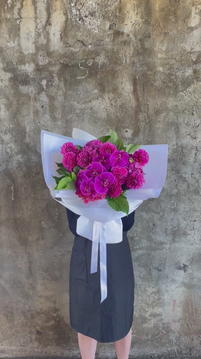 Video of the magenta bouquet, showing through the details of the bouquet.