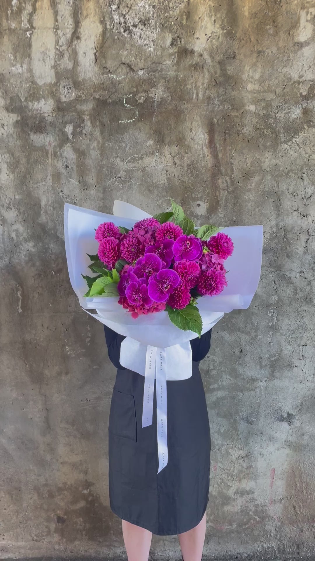 Video of the magenta bouquet, showing through the details of the bouquet.