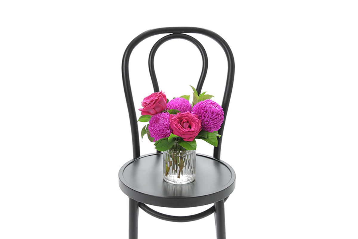 ROYCE small bright ribbed glass vase of hot pink flowers by Kate Hill Flowers Melbourne