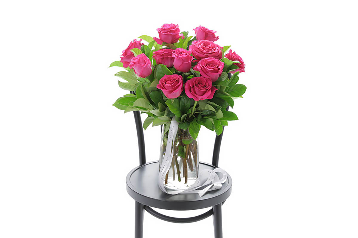 SASKIA hot pink roses in a tapered glass vase by Kate Hill Flowers Melbourne