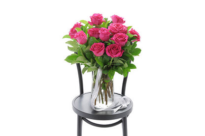 SASKIA hot pink roses in a tapered glass vase by Kate Hill Flowers Melbourne