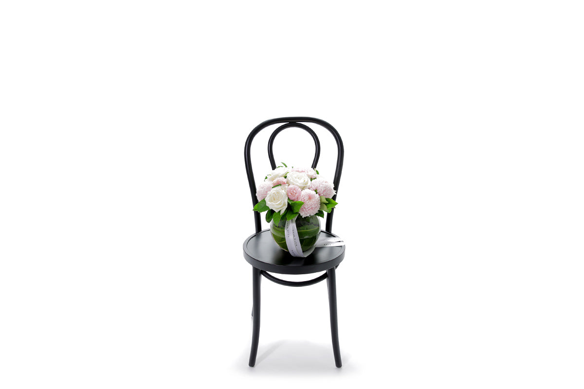 SERENITY pastel flowers in a 20cm glass ball vase