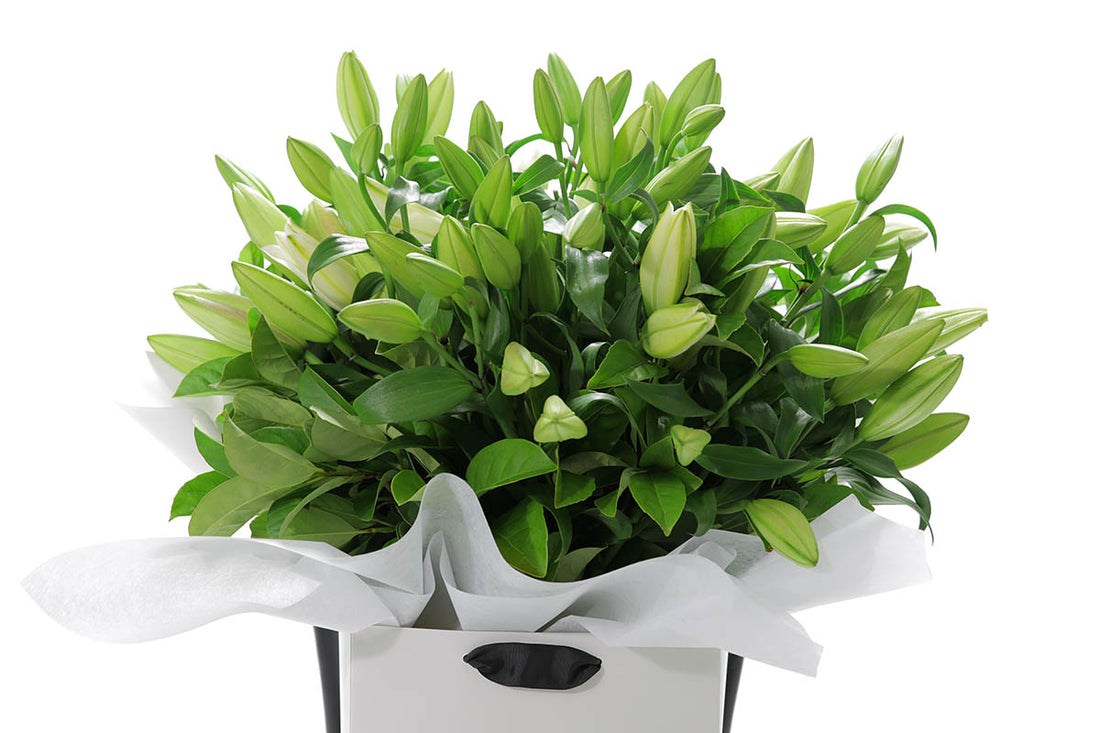 Close-up of VALERIE large bouquet with white oriental lilies