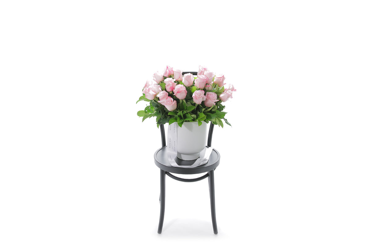 ZARA 20 soft pink roses in an extra large white footed ceramic vessel