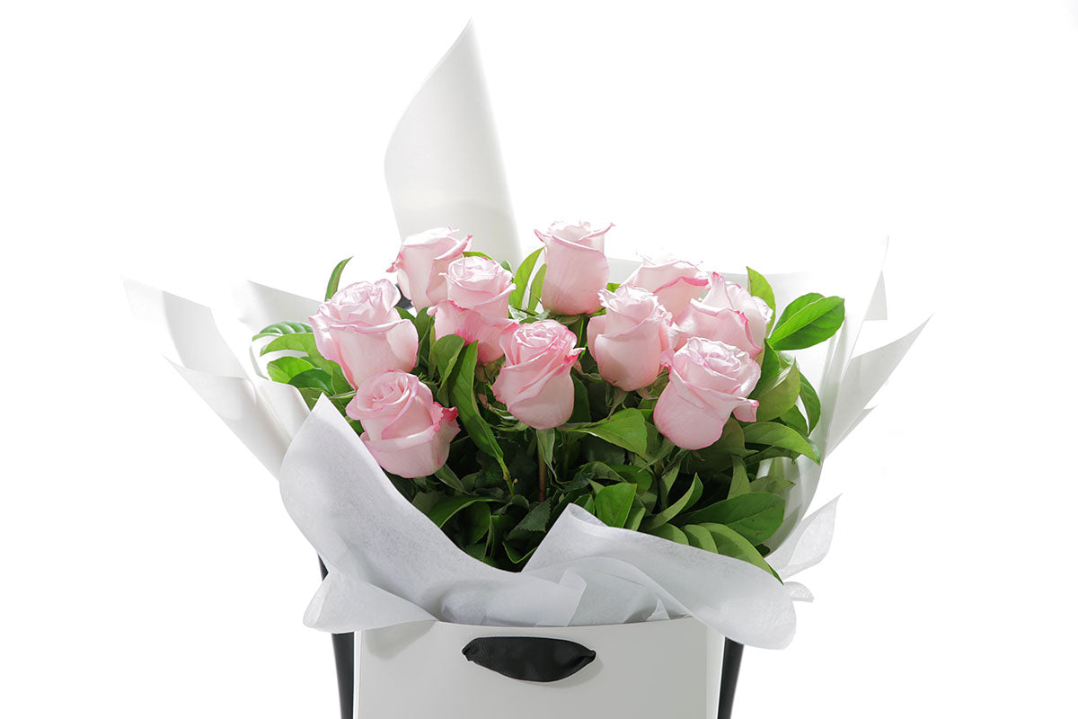 Close-up of ZARA bouquet with soft pink classic roses